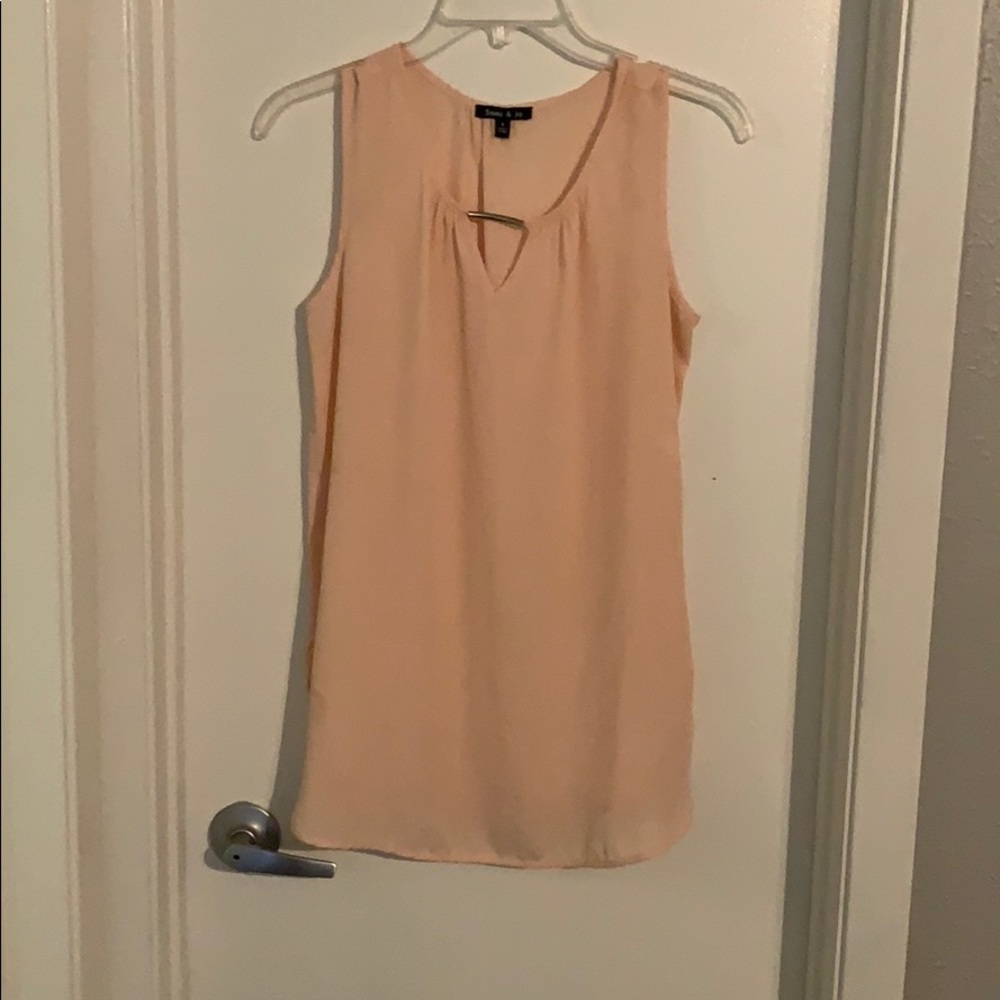 Pink sleeveless blouse